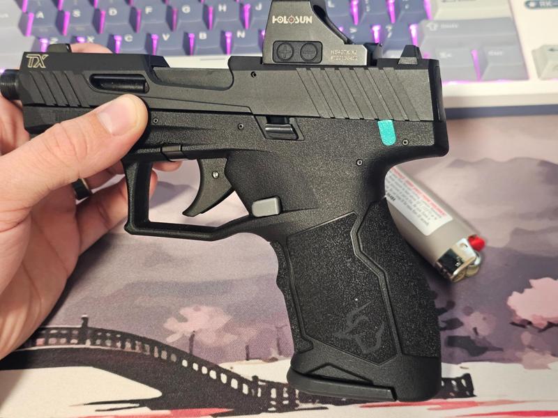 TX-22 Compact Extended Magazine Release