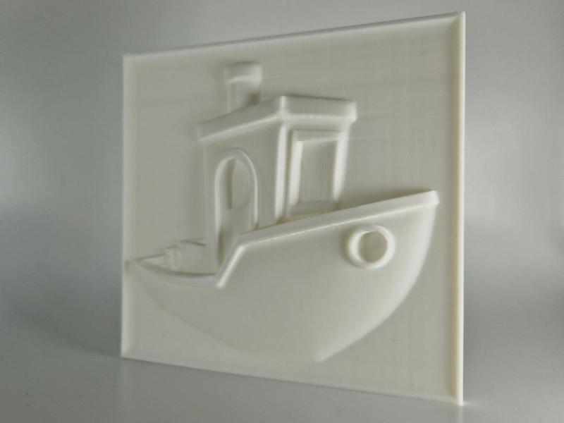 A relief artwork of the iconic Benchy