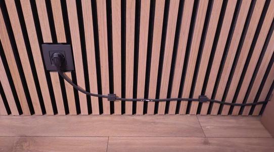 Cable clip for vertical wood panels