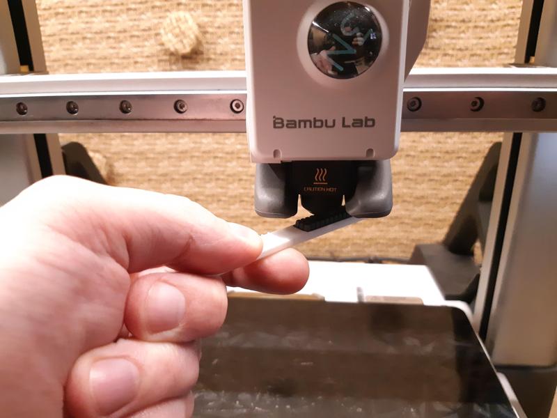 nozzle cleaning brush from spare rubber from bambulab a1