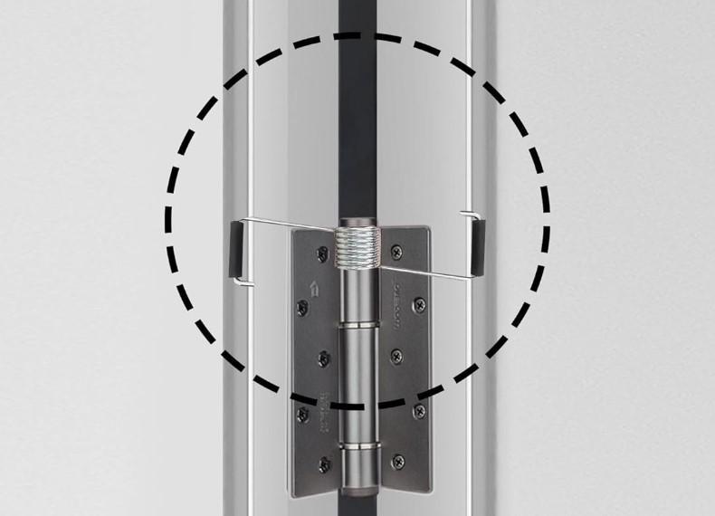Protective Backing for Door Hinge Spring