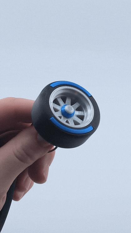 Spinning F1 Inspired Tire Keychain