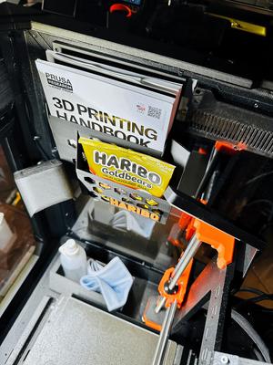Prusa Enclosure Haribo and User Manual holder.