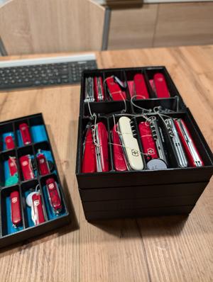 Stackable container for Swiss Army knives