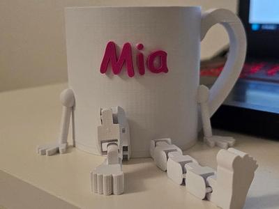 Mug, cup whit flexi legs with feet. Customize name
