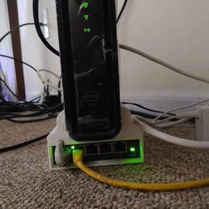 TPlink 5-port switch + Surfboard router base