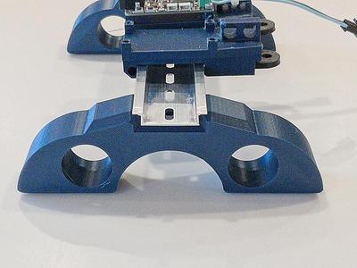 A photo stand for a din rail