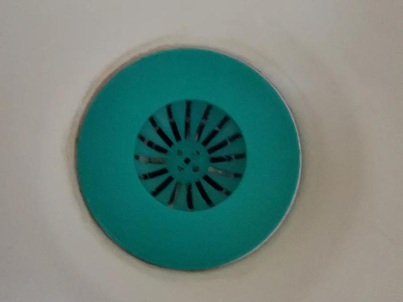 Bathtub drain hair strainer/hair catch