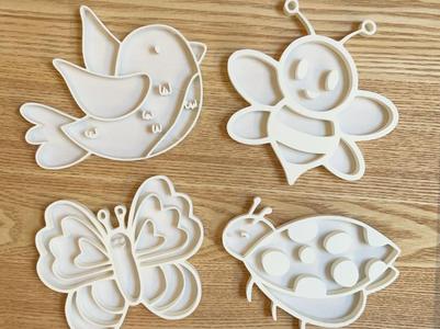 sensory play spring animals filling shapes