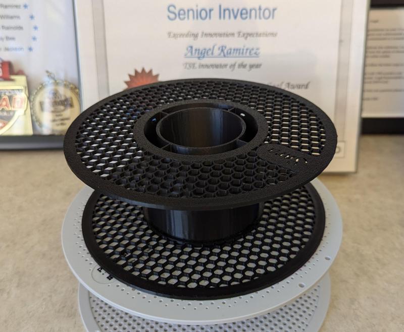 Bambu Labs filament spool reduced to print in an A1 Mini