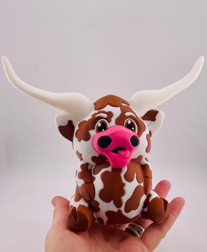 Texas Longhorn Cow Sitting