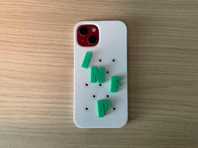 iPhone 13 perforated phone case with MBTI letter charms