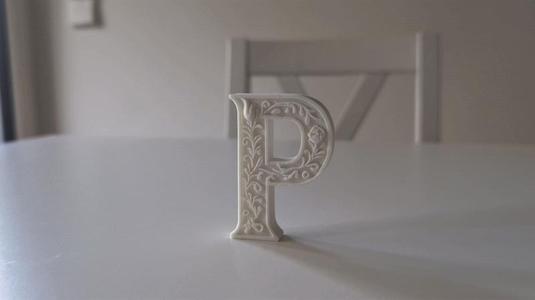 Standing Letter P in a Gypsum Floral Style