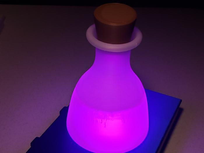 Magic potion bottle light and Book