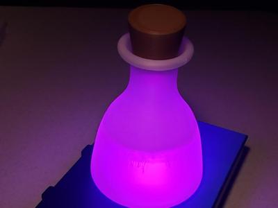 Magic potion bottle light and Book