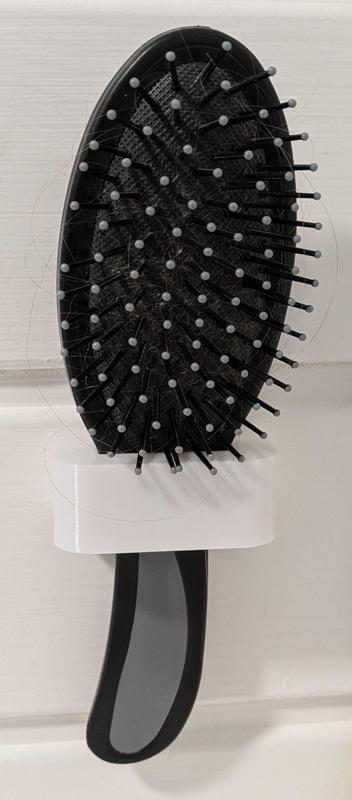 Hairbrush wall holder