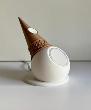 Gelato, charger holder for iPhone and Apple Watch.