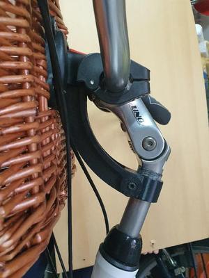 Bike basket handle locking device   