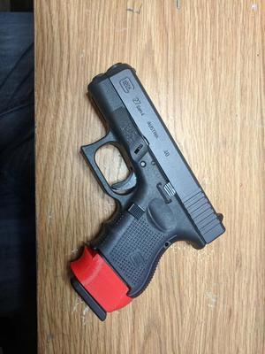 Magazine Sleeve for Using Glock 23 Mags in Glock 27