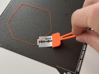 Razor blade flexible mini scraper/knife
