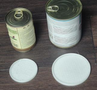 Lids to seal opened tins - Deckel für Konservendosen