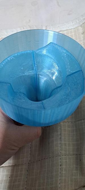 Helical marble server