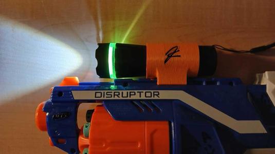 Flashlight holder for nerf