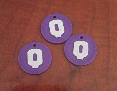 Quirinux logo medal/keychain