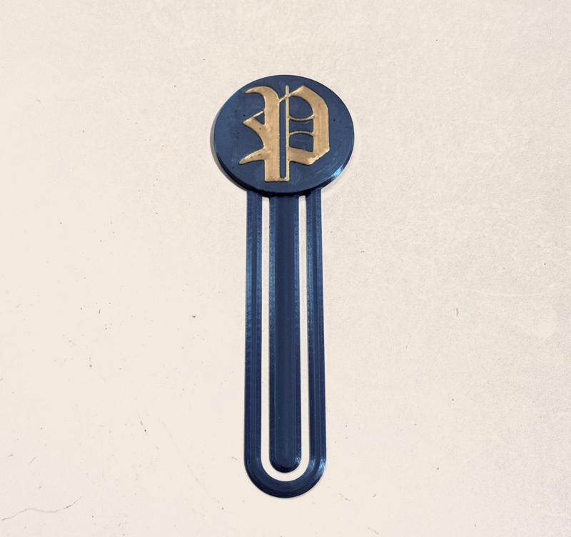 Bookmark with letter (P) logo MMU/AMS