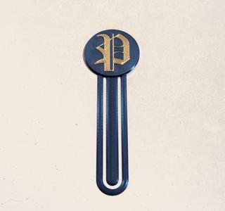 Bookmark with letter (P) logo MMU/AMS