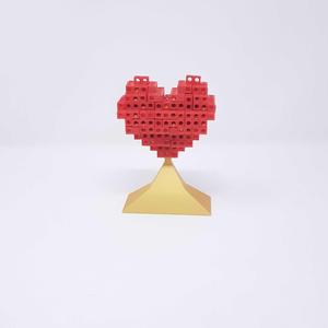 Heart shaped Tetris puzzle with a stand