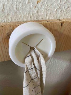 Push kitchen towel holder