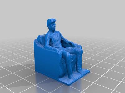 Young man in a chair