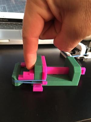 Mini rubber band vise