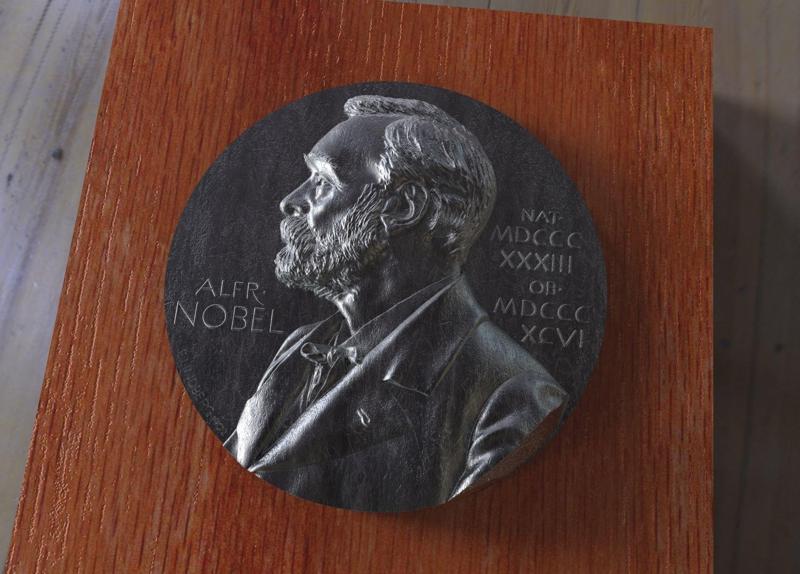 A replica of the Nobel medal obvers