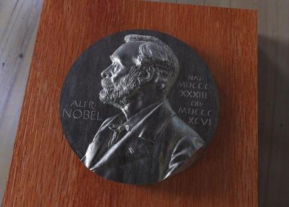 A replica of the Nobel medal obvers