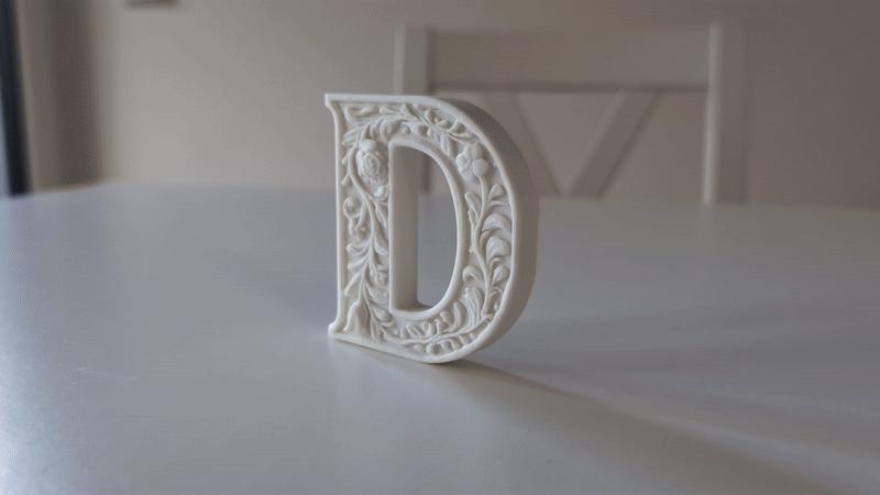 Standing Letter D in a Gypsum Floral Style 