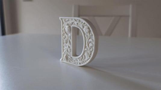 Standing Letter D in a Gypsum Floral Style 