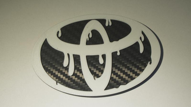 Dripping Toyota Emblem