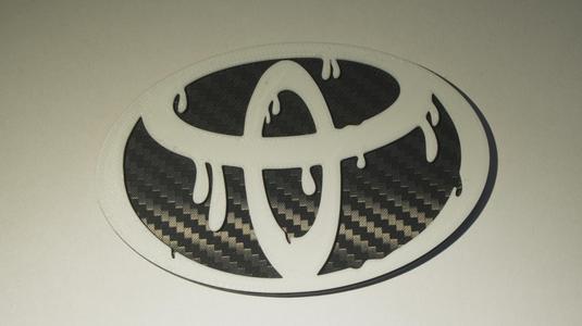 Dripping Toyota Emblem