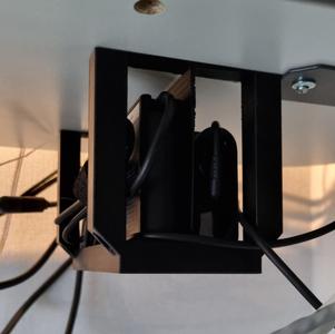 Dual power supply under-desk tray