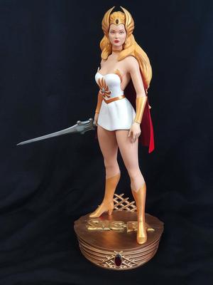 She-ra statue of woman holding sword