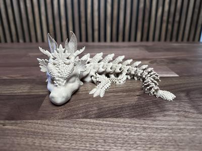Articulated Autumns Dragon STL.stl