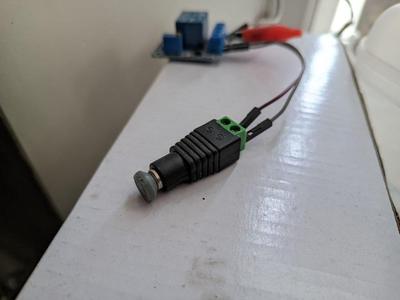 Dust cap for DC power cable female plug connector