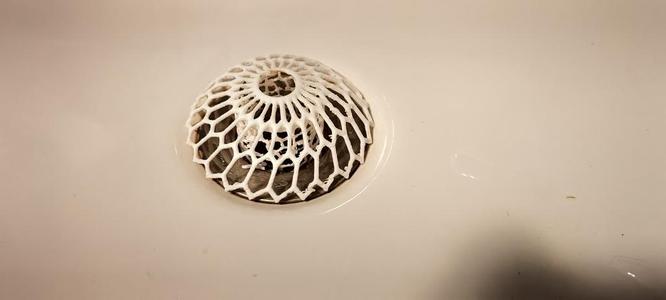 Sink strainer aka sink outlet etc - net or grid art design