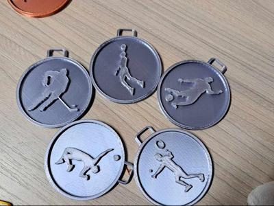 Medals set - football hockey volleyball basketball