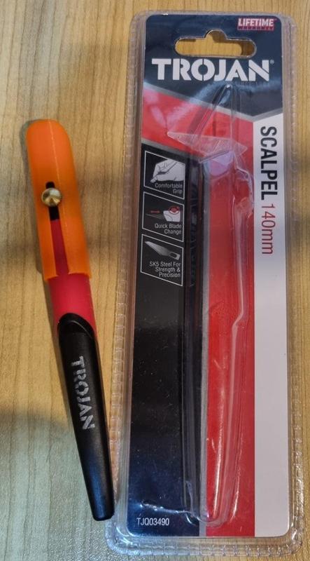 Trojan scalpel cap