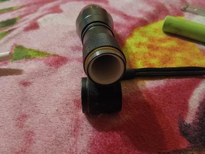 Flashlight battery spacer to 18650