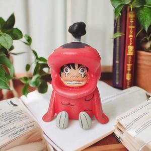 Monkey D. Luffy in a fish costume from One Piece (Dressrosa Arc.)
