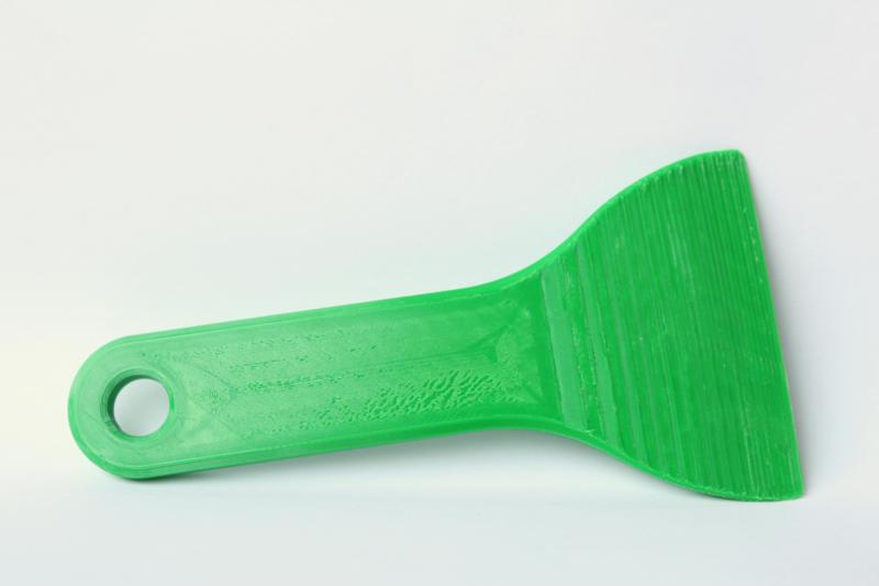 Ice scraper with rounded edge for inside of windshield